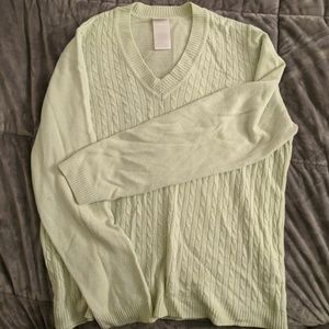 Green cable knit sweater
